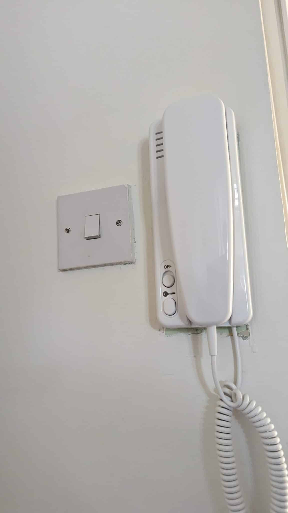Internal apartment intercom handset for communal door entry system
