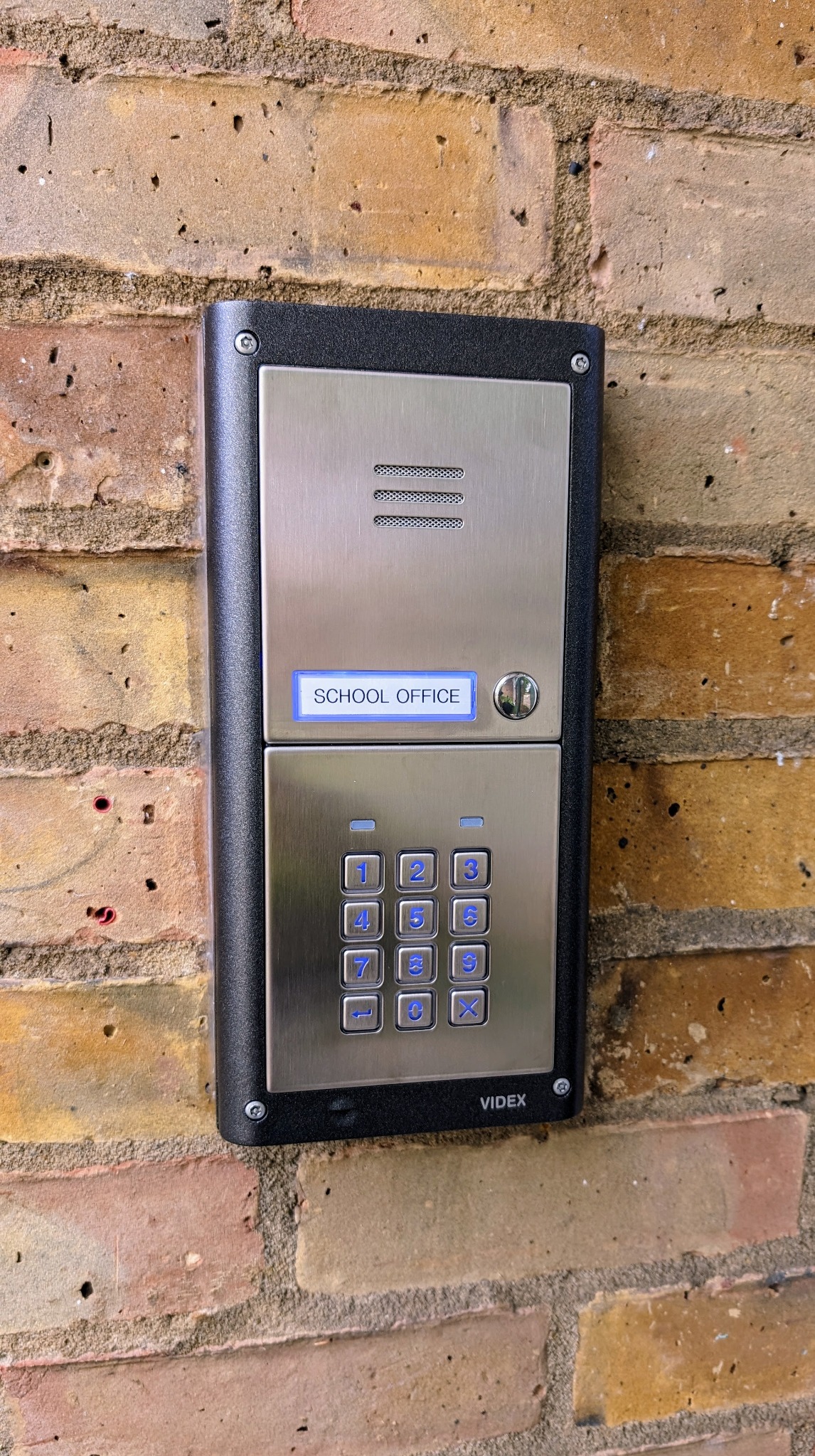 Videx intercom and keypad entry system at school entrance